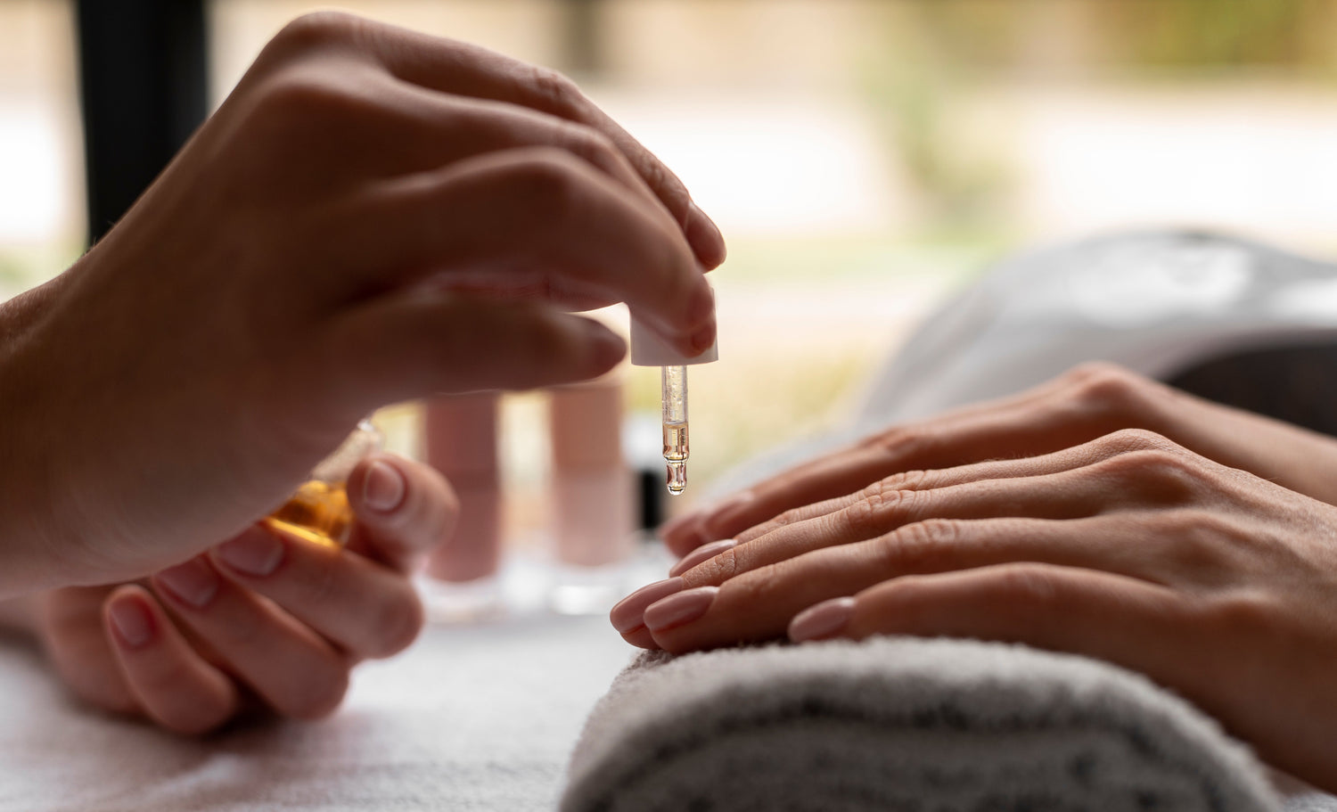 Using nail oil close up